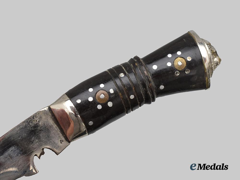 united_kingdom._a_post_war_british_india_gurkha_kukri_with_scabbard___m_n_c1746