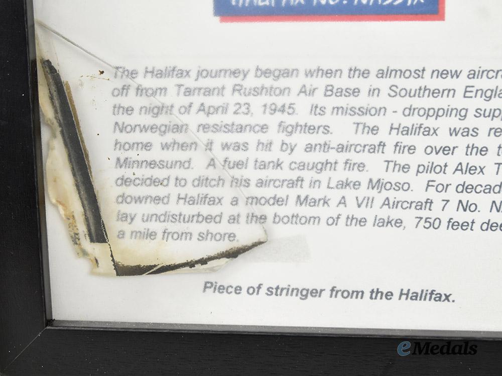 united_kingdom._framed_stringer_and_glass_pieces_of_the_downed_halifax,_april1945___m_n_c1787