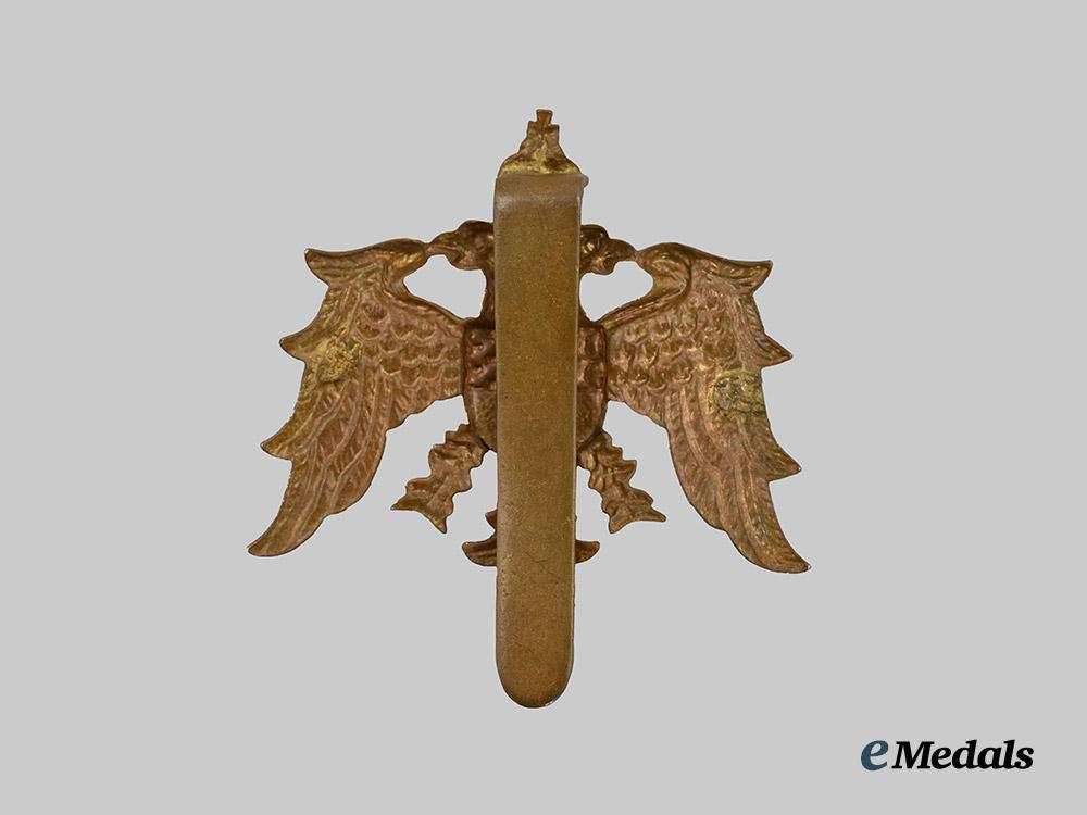 yugoslavia,_kingdom._an_english_made_cap_badge_for_refugees,_c.1942___m_n_c1957