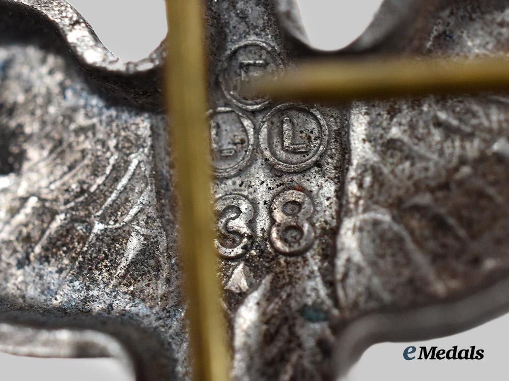 germany,_third_reich._a_mixed_lot_of_uniform_insignia___m_n_c2013