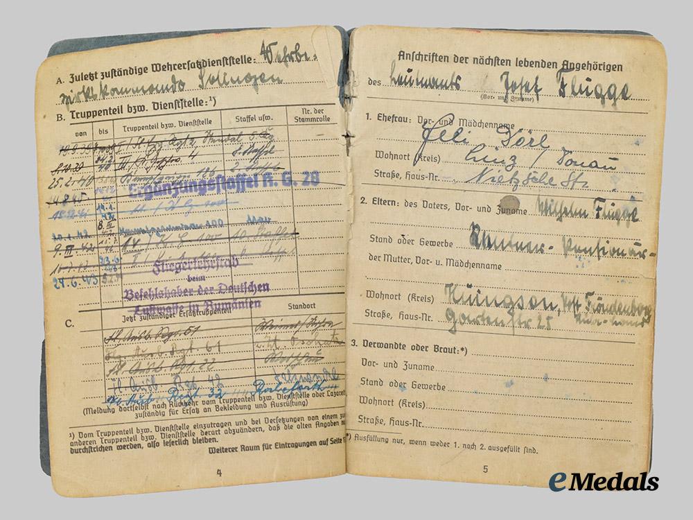germany,_luftwaffe._a_soldbuch_to_josef_flügge,_honour_goblet_and_german_cross_in_gold_recipient___m_n_c2075