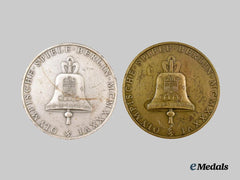 Germany, Third Reich. A Pair of 1936 Berlin Olympics Commemorative Medallions, Bronze and Silver Grades