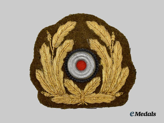 germany,_kriegsmarine._an_officer’s_tropical_visor_cap_insignia___m_n_c2085