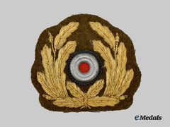 Germany, Kriegsmarine. An Officer’s Tropical Visor Cap Insignia