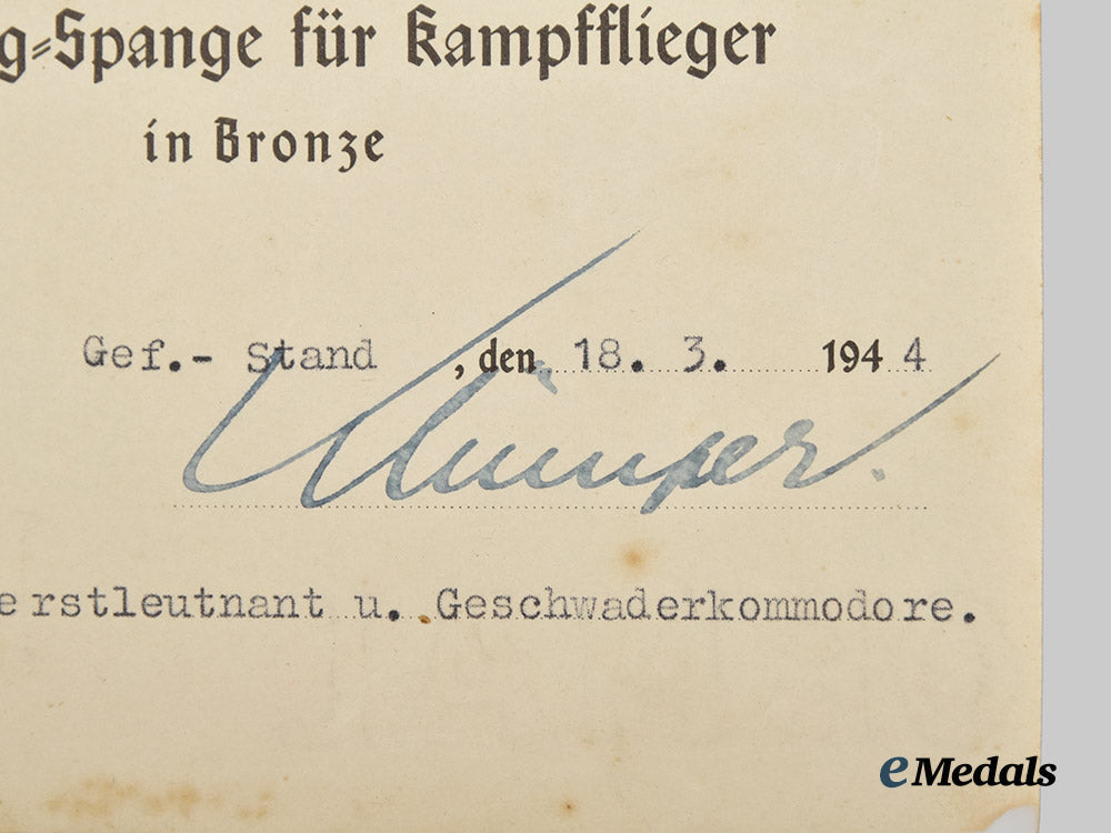 germany,_third_reich._an_award_document_for_a_bomber_clasp,_bronze_grade,_signed_by_knight’s_cross_recipient_werner_klümper___m_n_c2201