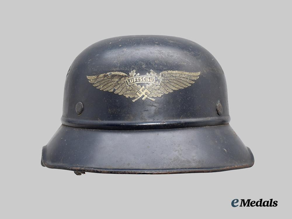 germany,_third_reich._a_luftschutz_gladiator_helmet,_three-_piece_version_by_paul_diener___m_n_c2316