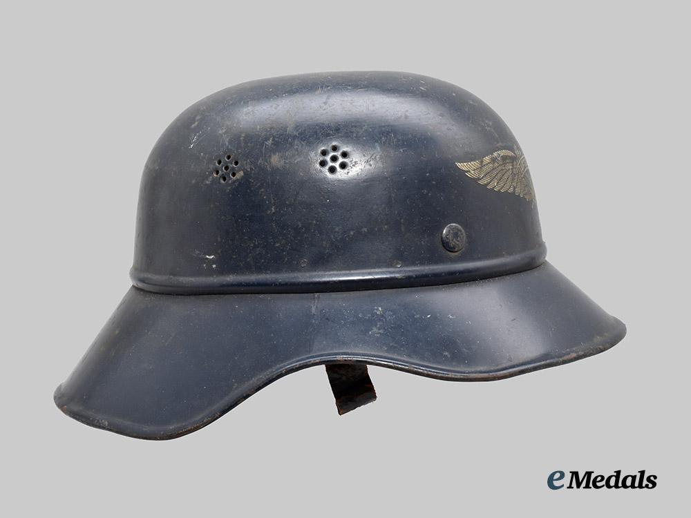 germany,_third_reich._a_luftschutz_gladiator_helmet,_three-_piece_version_by_paul_diener___m_n_c2319