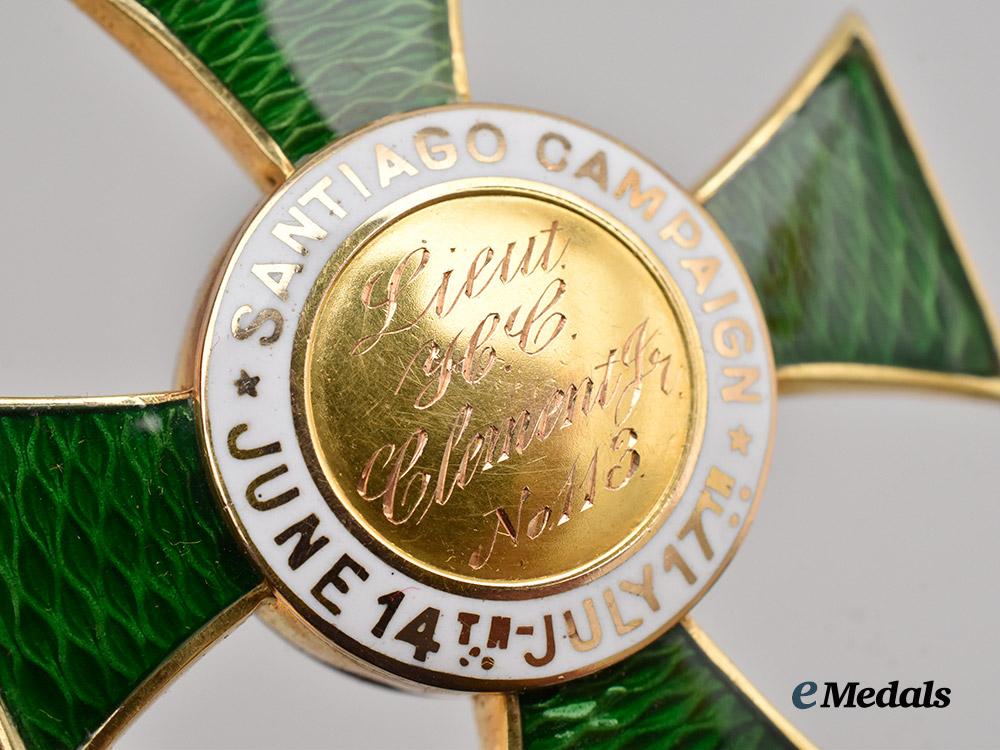 united_states._a_society_of_the_army_of_santiago_membership_cross_in_gold___m_n_c2397