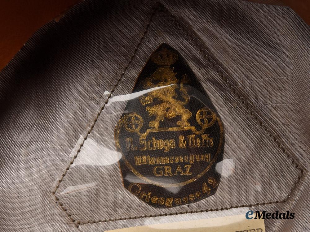 germany,_luftwaffe._an_officer’s_visor_cap,_owner-_attributed_example,_by_n._schega&_neffe___m_n_c2479