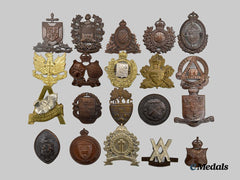 Canada, Commonwealth. A Lot of Twenty-One Second War University/College Canadian Officer Training Corps (COTC) Cap Badges