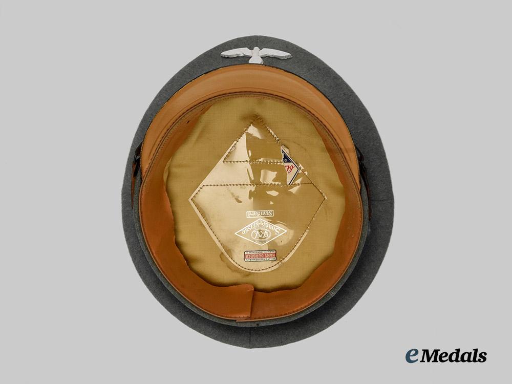 germany,_heer._a_medical_e_m/_n_c_o’s_visor_cap,_by_e_r_e_l___m_n_c2562