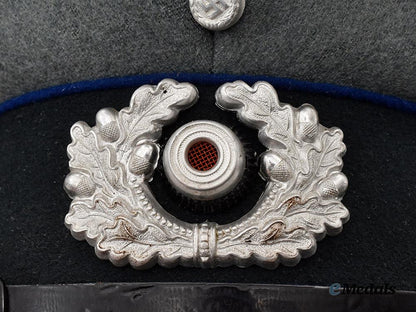 germany,_heer._a_medical_e_m/_n_c_o’s_visor_cap,_by_e_r_e_l___m_n_c2565