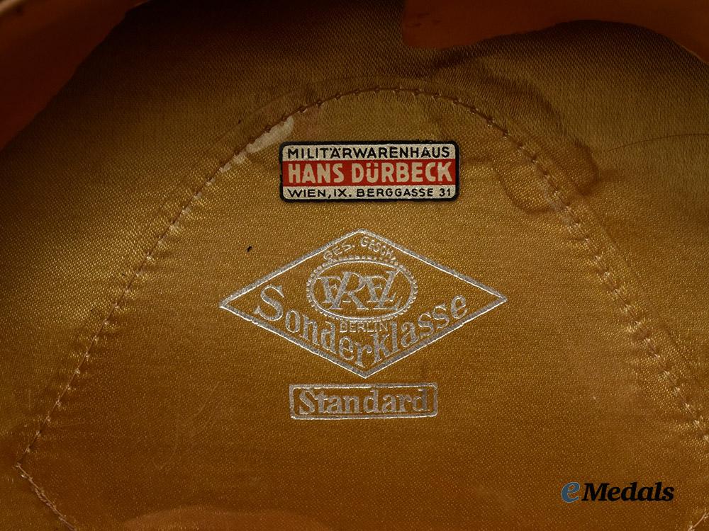 germany,_heer._a_medical_e_m/_n_c_o’s_visor_cap,_by_e_r_e_l___m_n_c2567