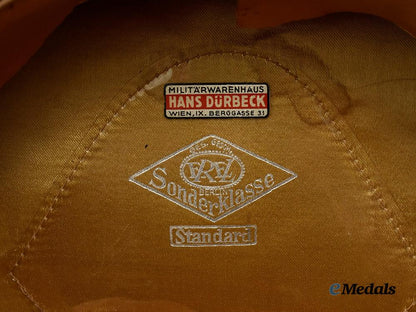 germany,_heer._a_medical_e_m/_n_c_o’s_visor_cap,_by_e_r_e_l___m_n_c2567