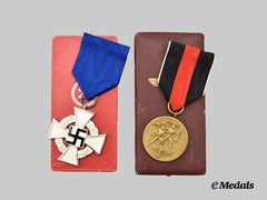 Germany, Third Reich. A Pair of Cased Medals for Civil and Occupation Service