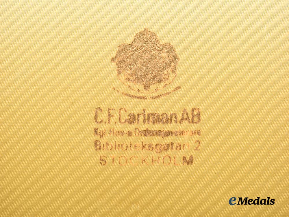 sweden,_kingdom._a_cased_royal_order_of_the_polar_star_to_dottore_p._meschini,_i_i._class_commander,_type_i_i,_by_c._f._carlman,_c.1930___m_n_c3013