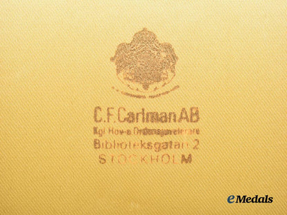 sweden,_kingdom._a_cased_royal_order_of_the_polar_star_to_dottore_p._meschini,_i_i._class_commander,_type_i_i,_by_c._f._carlman,_c.1930___m_n_c3013