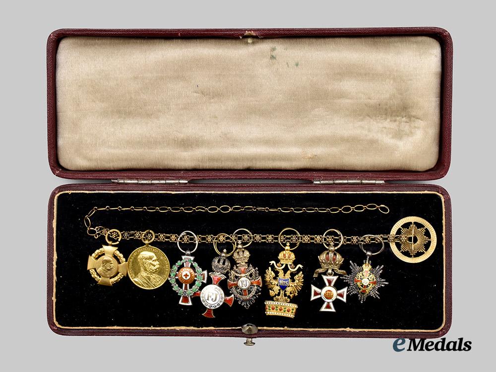 austria,_imperial._a_fine_chain_of_miniature_imperial_orders_by_vincent_mayer,_in_gold,_with_case___m_n_c3091