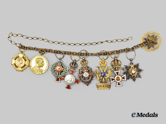 austria,_imperial._a_fine_chain_of_miniature_imperial_orders_by_vincent_mayer,_in_gold,_with_case___m_n_c3097