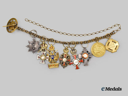 austria,_imperial._a_fine_chain_of_miniature_imperial_orders_by_vincent_mayer,_in_gold,_with_case___m_n_c3100