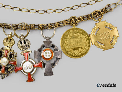 austria,_imperial._a_fine_chain_of_miniature_imperial_orders_by_vincent_mayer,_in_gold,_with_case___m_n_c3101