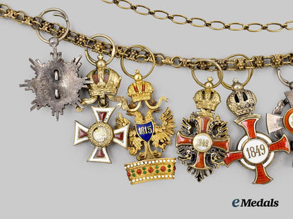austria,_imperial._a_fine_chain_of_miniature_imperial_orders_by_vincent_mayer,_in_gold,_with_case___m_n_c3102