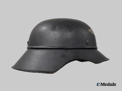 germany,_third_reich._a_luftschutz_gladiator_helmet,_three-_piece_version,_by_paul_diener___m_n_c3114