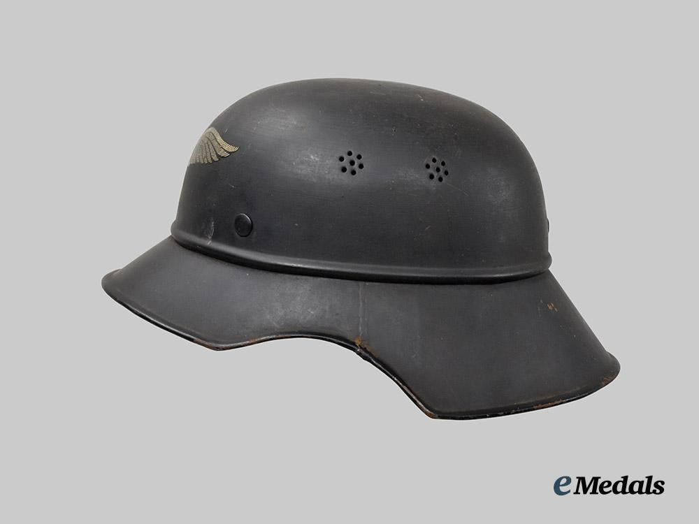 germany,_third_reich._a_luftschutz_gladiator_helmet,_three-_piece_version,_by_paul_diener___m_n_c3115