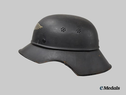germany,_third_reich._a_luftschutz_gladiator_helmet,_three-_piece_version,_by_paul_diener___m_n_c3115