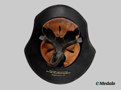 germany,_third_reich._a_luftschutz_gladiator_helmet,_three-_piece_version,_by_paul_diener___m_n_c3117