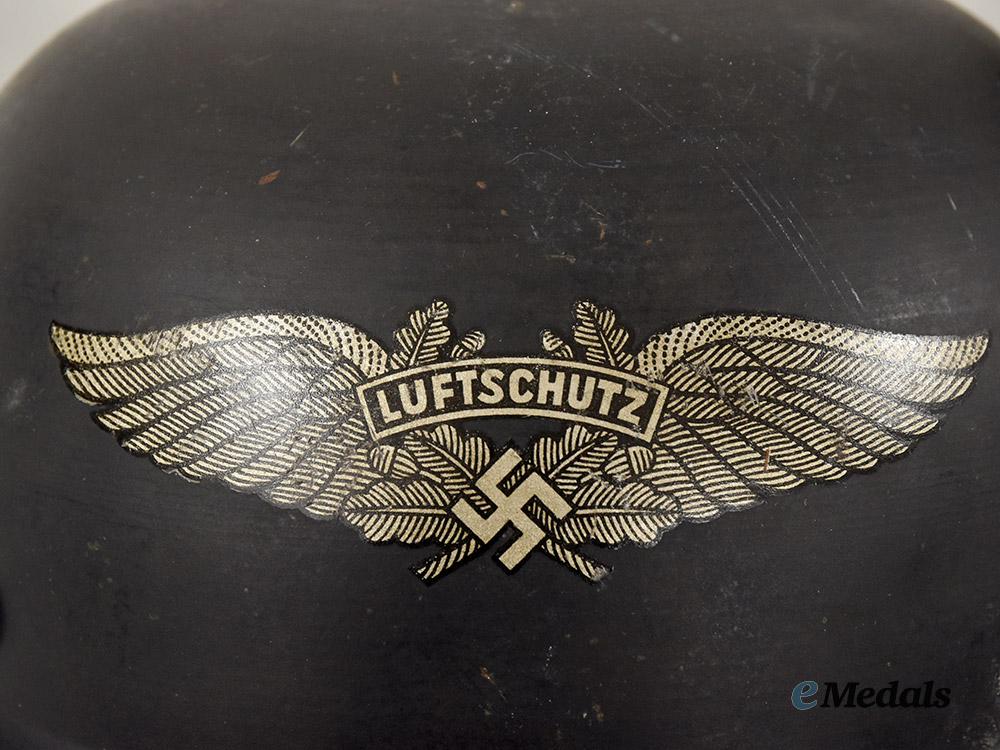 germany,_third_reich._a_luftschutz_gladiator_helmet,_three-_piece_version,_by_paul_diener___m_n_c3124