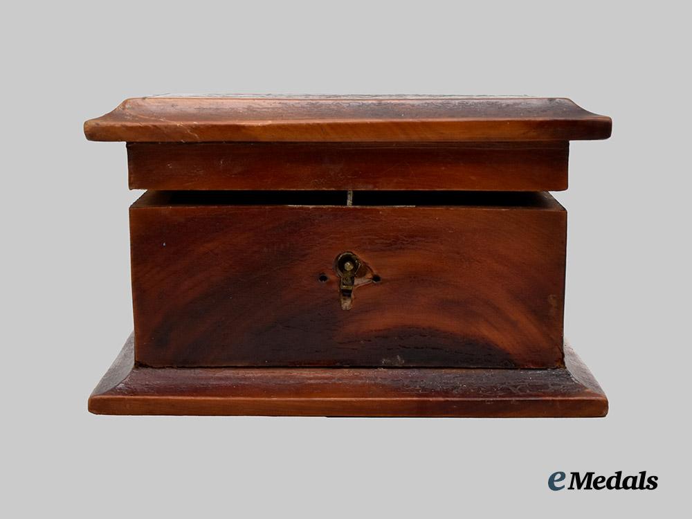germany,_imperial._a_trench_art_money_box_carved_by_a_german_p_o_w_in_bermuda___m_n_c3126