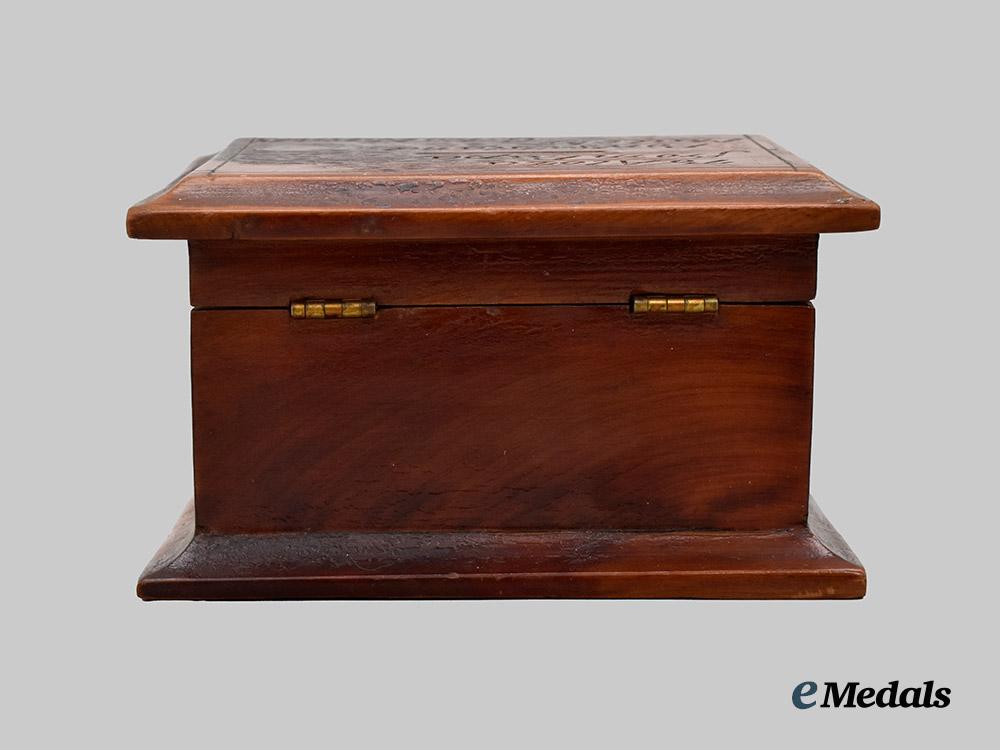 germany,_imperial._a_trench_art_money_box_carved_by_a_german_p_o_w_in_bermuda___m_n_c3127
