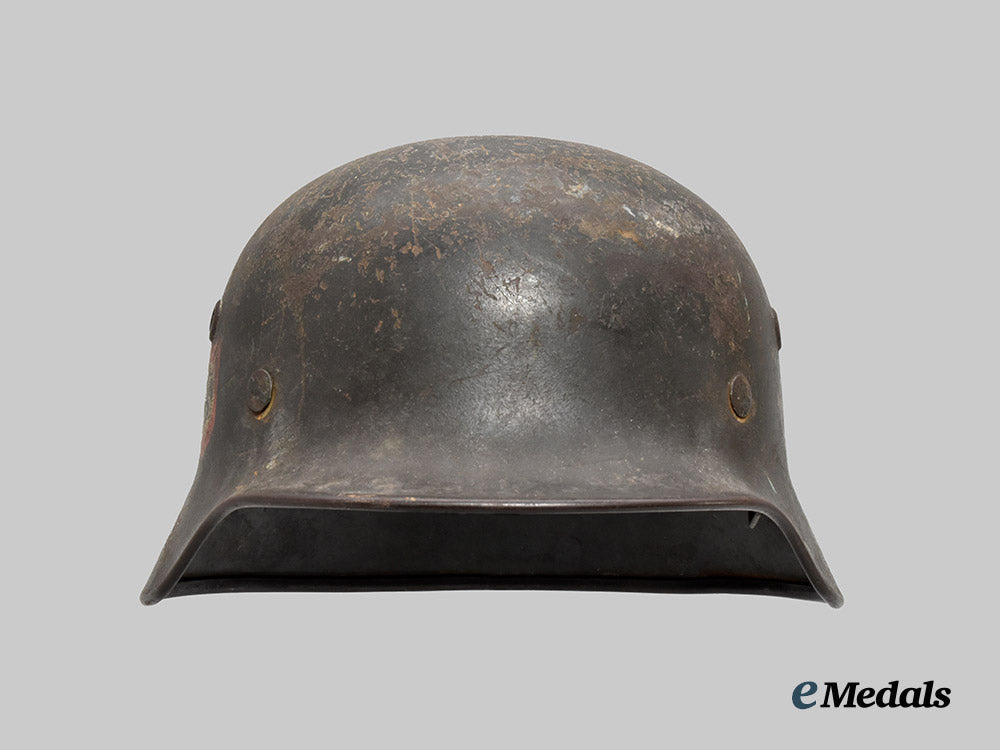 germany,_ordnungspolizei._an_m40_stahlhelm,_double_decal_and_owner-_attributed_example,_by_f._w._quist___m_n_c3128