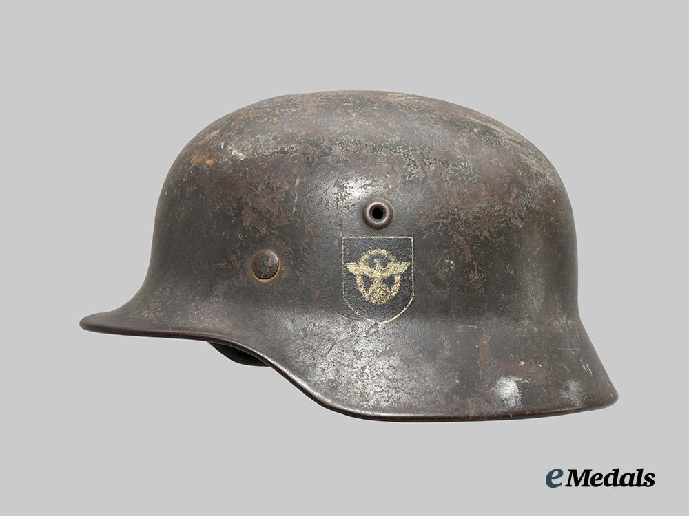 germany,_ordnungspolizei._an_m40_stahlhelm,_double_decal_and_owner-_attributed_example,_by_f._w._quist___m_n_c3131