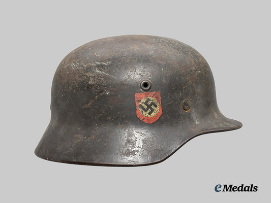 germany,_ordnungspolizei._an_m40_stahlhelm,_double_decal_and_owner-_attributed_example,_by_f._w._quist___m_n_c3132