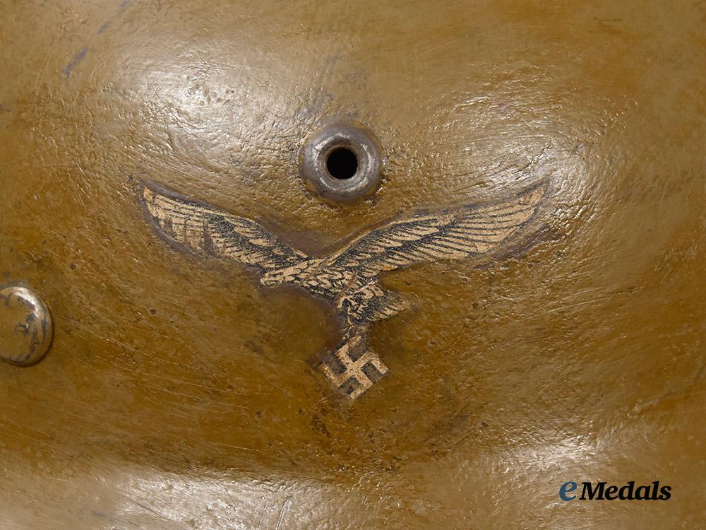 germany,_luftwaffe._an_m42_stahlhelm,_field-_modified_for_the_mediterranean_theatre___m_n_c3132