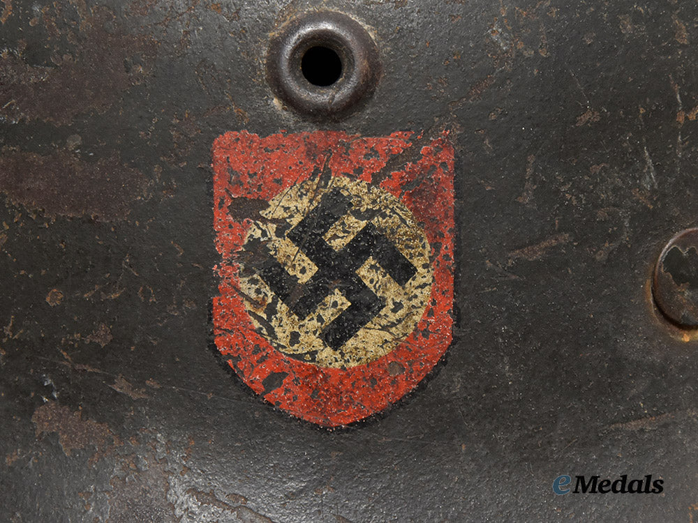 germany,_ordnungspolizei._an_m40_stahlhelm,_double_decal_and_owner-_attributed_example,_by_f._w._quist___m_n_c3133