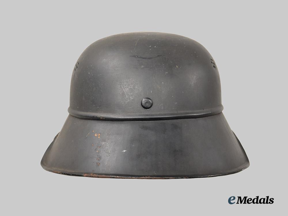 germany,_third_reich._a_luftschutz_gladiator_helmet,_three-_piece_version,_by_paul_diener___m_n_c3136