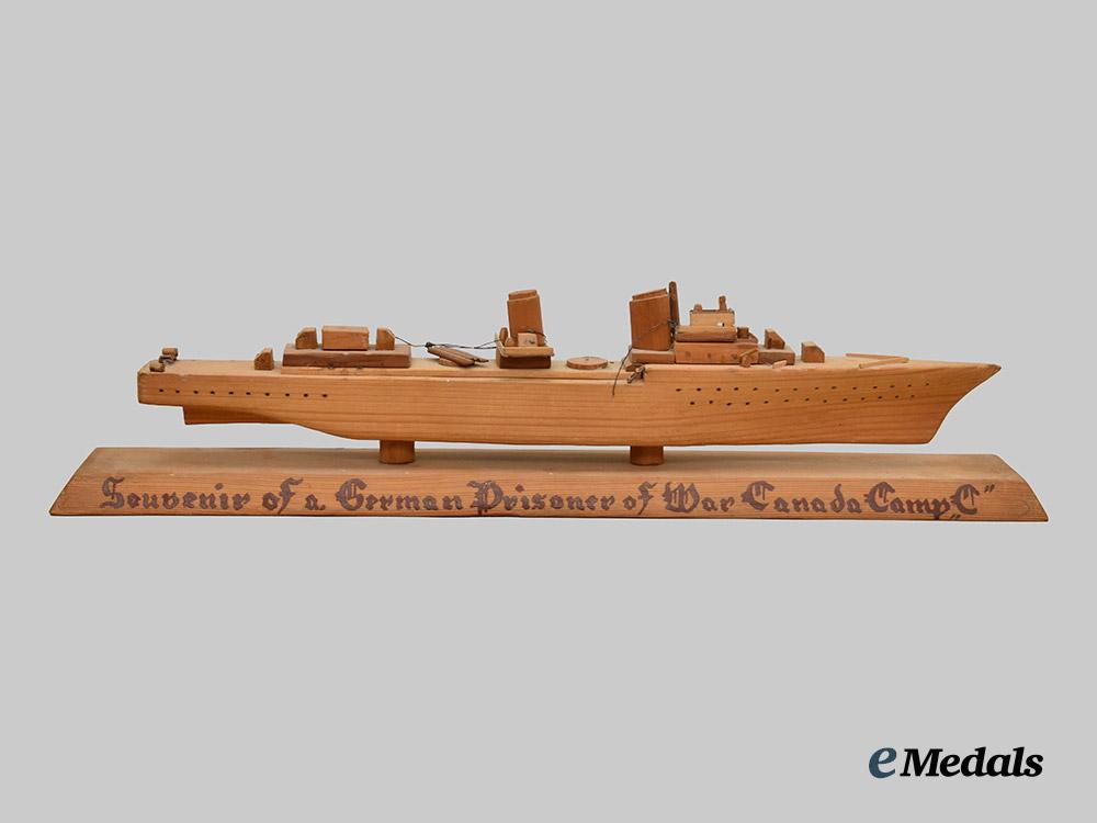 germany,_wehrmacht._a_model_battleship_hand-_carved_in_gravenhurst_p_o_w_camp___m_n_c3136