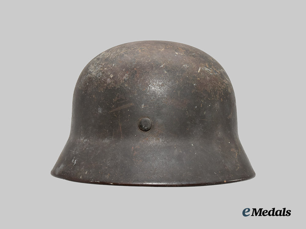 germany,_ordnungspolizei._an_m40_stahlhelm,_double_decal_and_owner-_attributed_example,_by_f._w._quist___m_n_c3141