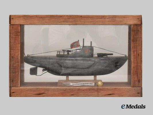 germany,_kriegsmarine._a_cased_model_of_u-99_carved_by_an_inmate_of_bowmanville_p_o_w_camp___m_n_c3210