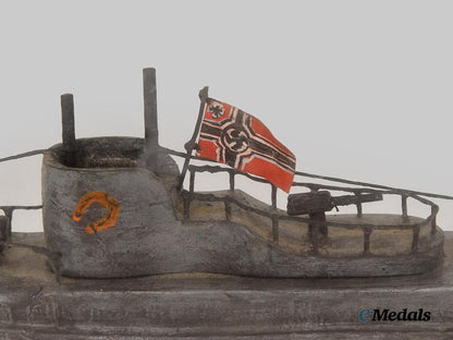 germany,_kriegsmarine._a_cased_model_of_u-99_carved_by_an_inmate_of_bowmanville_p_o_w_camp___m_n_c3213