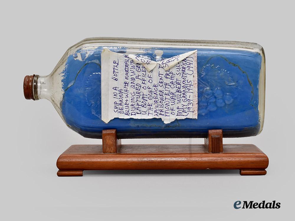 germany,_kriegsmarine._a_ship_in_a_bottle_crafted_by_a_german_p_o_w_in_canadian_custody___m_n_c3229