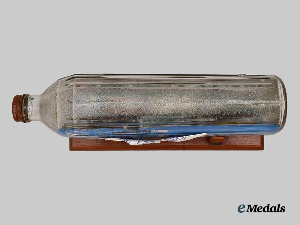 germany,_kriegsmarine._a_ship_in_a_bottle_crafted_by_a_german_p_o_w_in_canadian_custody___m_n_c3230