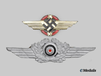 germany,_third_reich._a_pair_of_visor_cap_insignia___m_n_c3382
