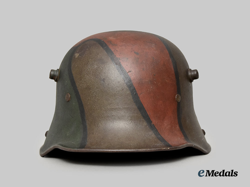germany,_imperial._a_model1916_camouflage_steel_helmet,_by_eisenhüttenwerke_thale___m_n_c3495