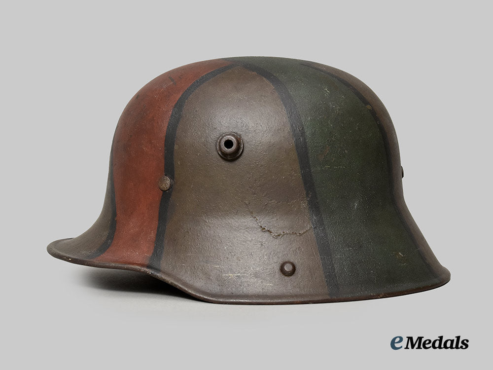 germany,_imperial._a_model1916_camouflage_steel_helmet,_by_eisenhüttenwerke_thale___m_n_c3496
