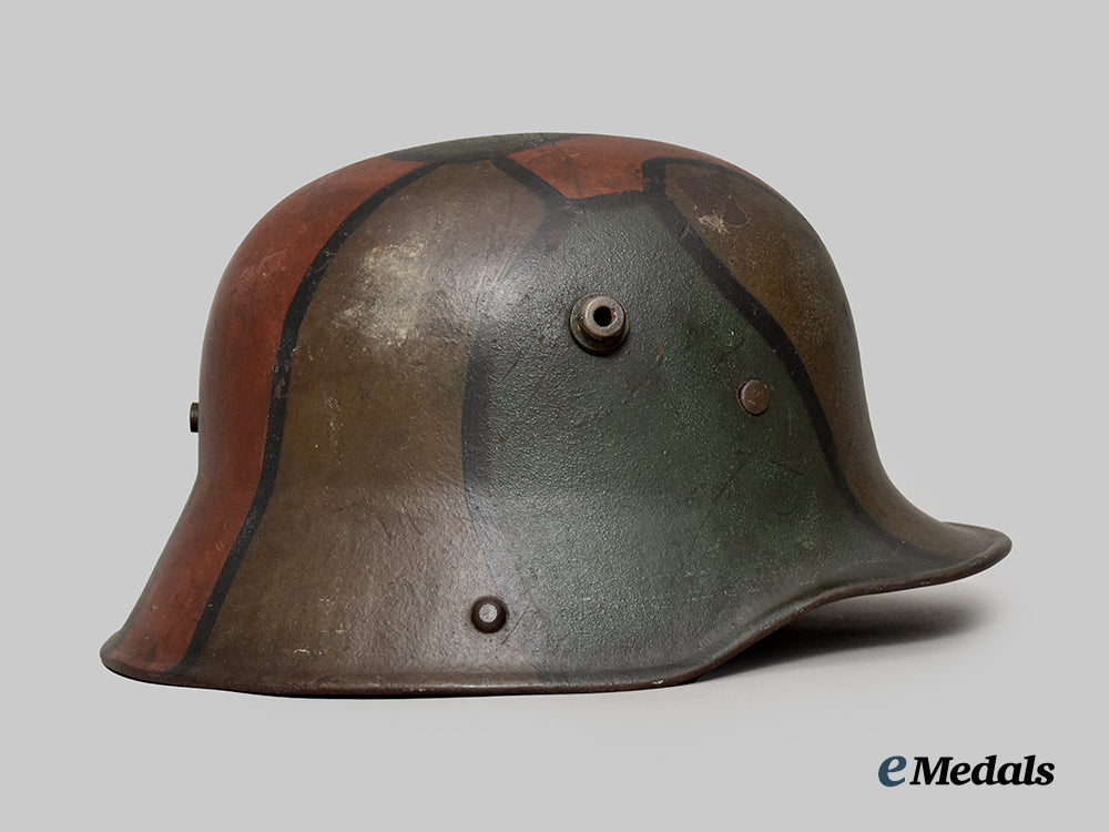 germany,_imperial._a_model1916_camouflage_steel_helmet,_by_eisenhüttenwerke_thale___m_n_c3497