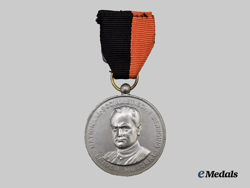 netherlands,_n_s_b._a1942_christmas_march_participant’s_medal___m_n_c3747
